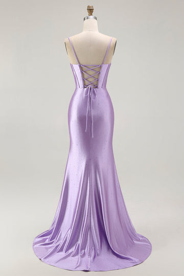 Vestido largo de fiesta con corsé de sirena morado fruncido y abertura con volantes